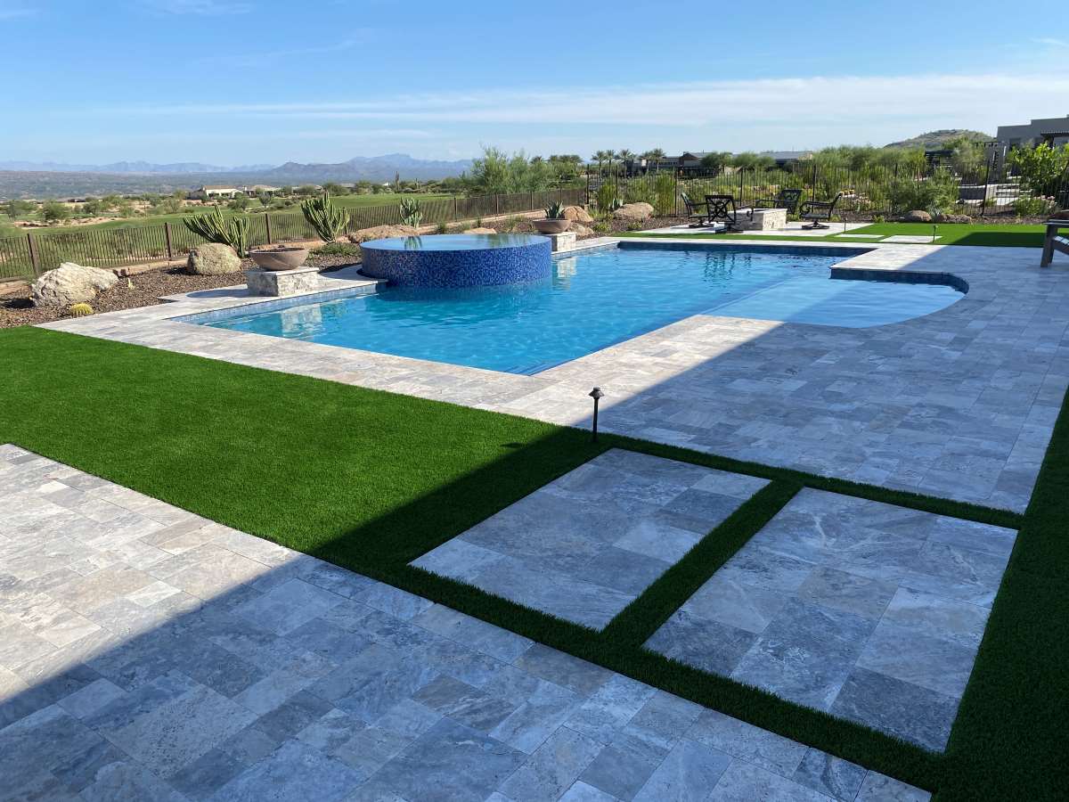 Custom concrete swimming pool built by Saturn Pool Company in Arizona