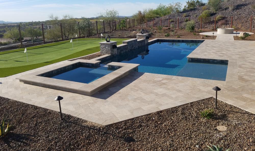 Custom concrete swimming pool built by Saturn Pool Company in Arizona