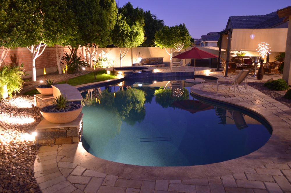 Custom pool and outdoor living space built by Saturn Pool Company in Arizona