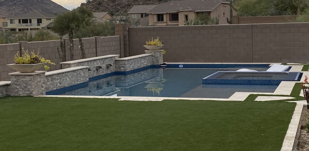 Custom concrete swimming pool built by Saturn Pool Company in Arizona